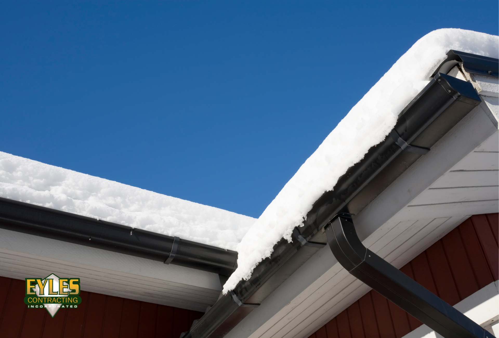 Snow build up on the roof of a home