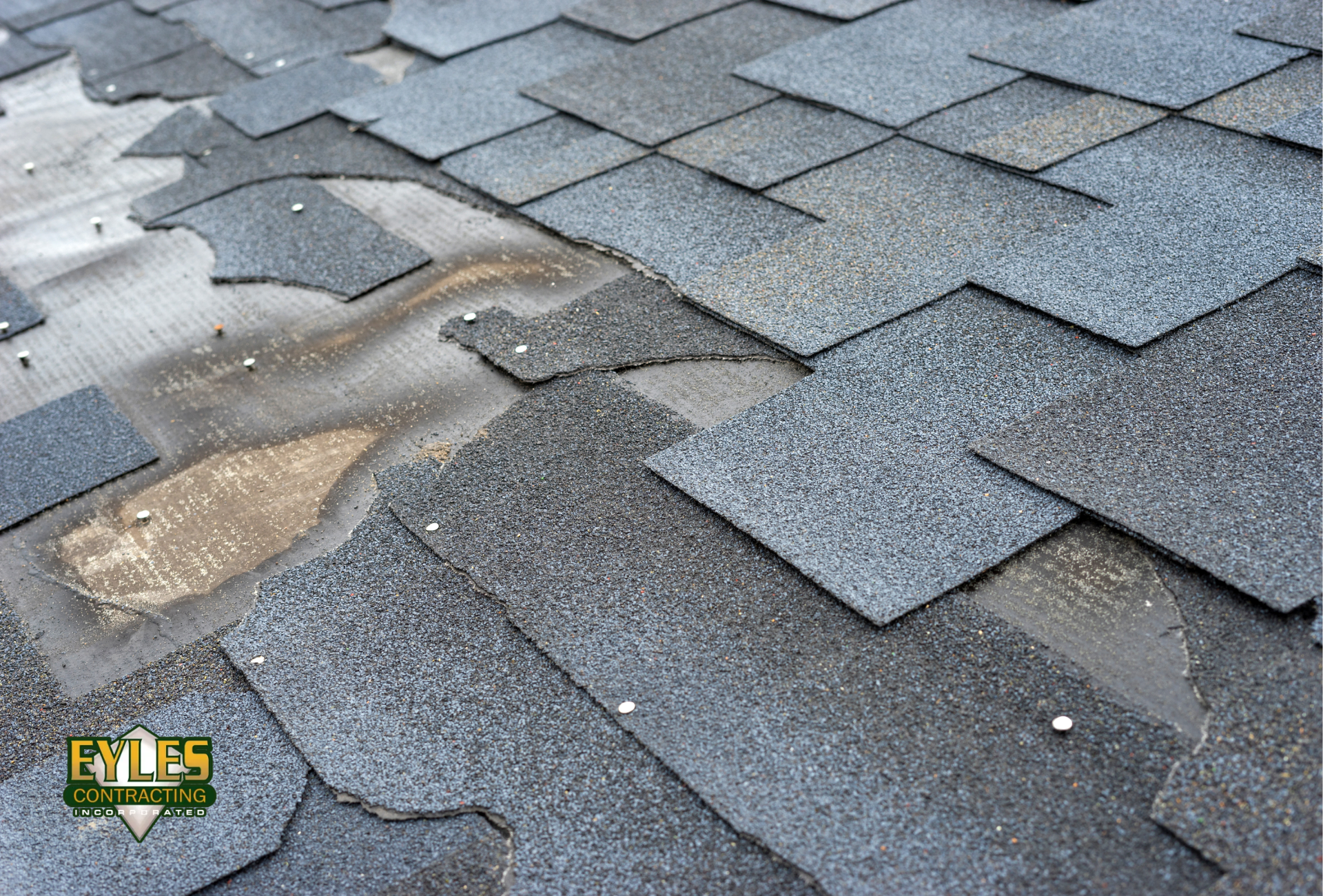 Damaged Roof with Missing Asphalt Shingles