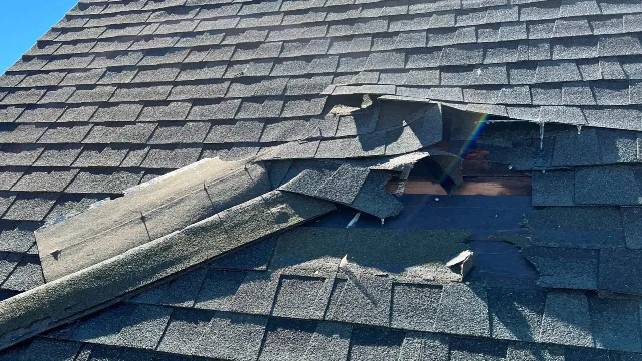 A close up of a roof with a hole in it.