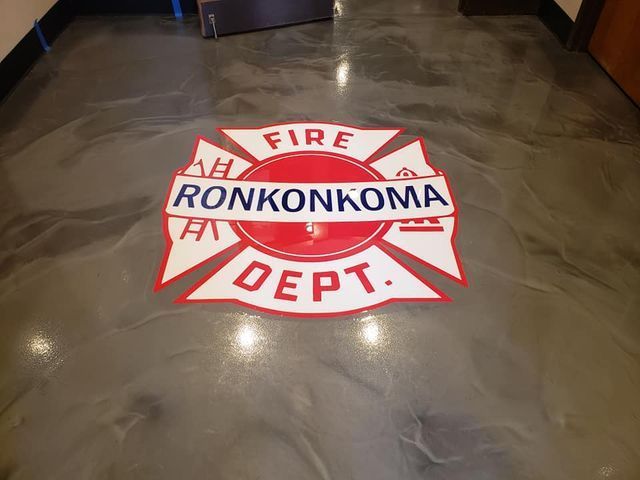 a fire department logo is painted on the floor