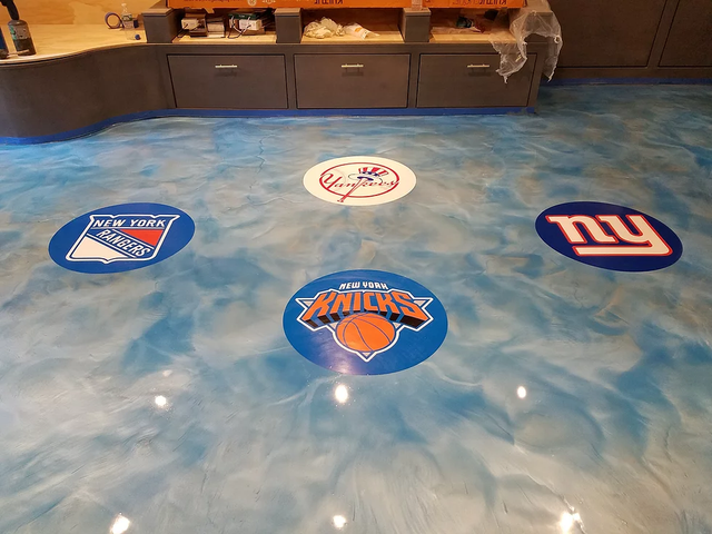 a kitchen floor with logos for the new york yankees , new york knicks , and new york giants .