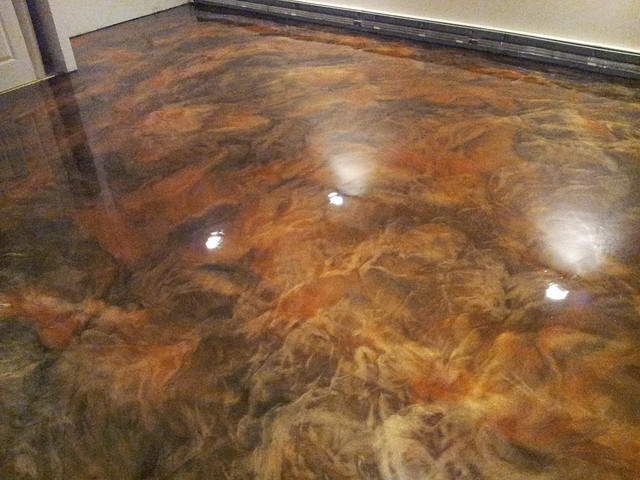 a close up of a shiny metallic floor in a room .