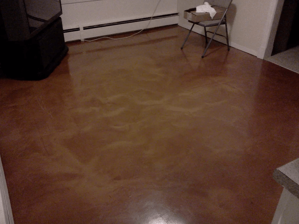 a chair sits on a wooden floor in a living room