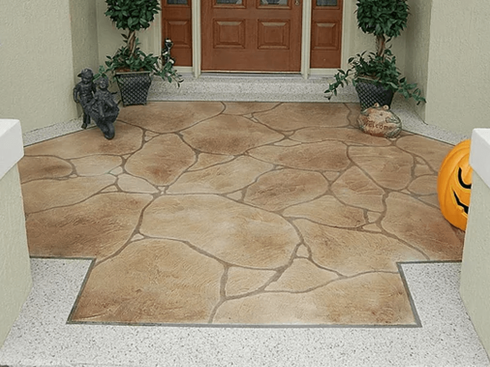 a stone floor with a pumpkin in front of it