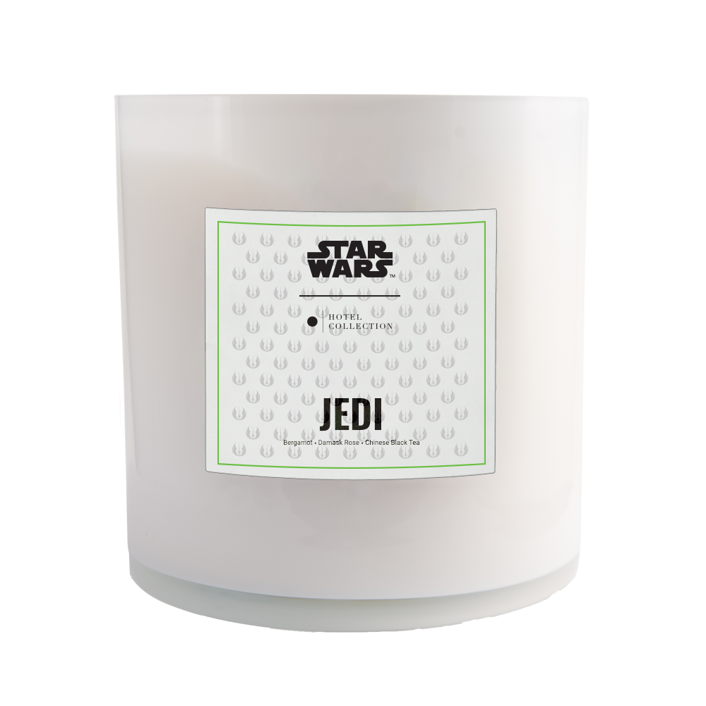 A star wars candle with a label that says jedi