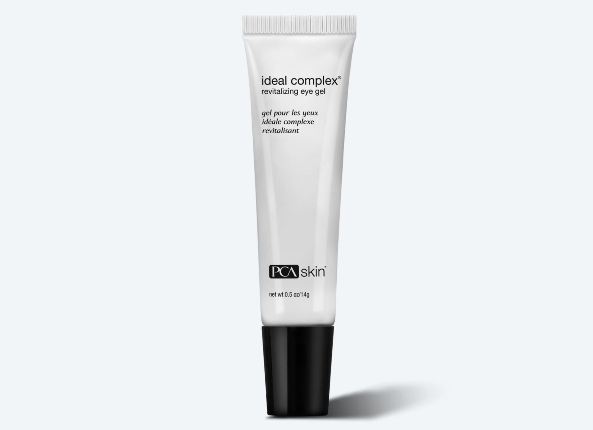 A tube of ideal so no plex eye cream is sitting on a white surface.