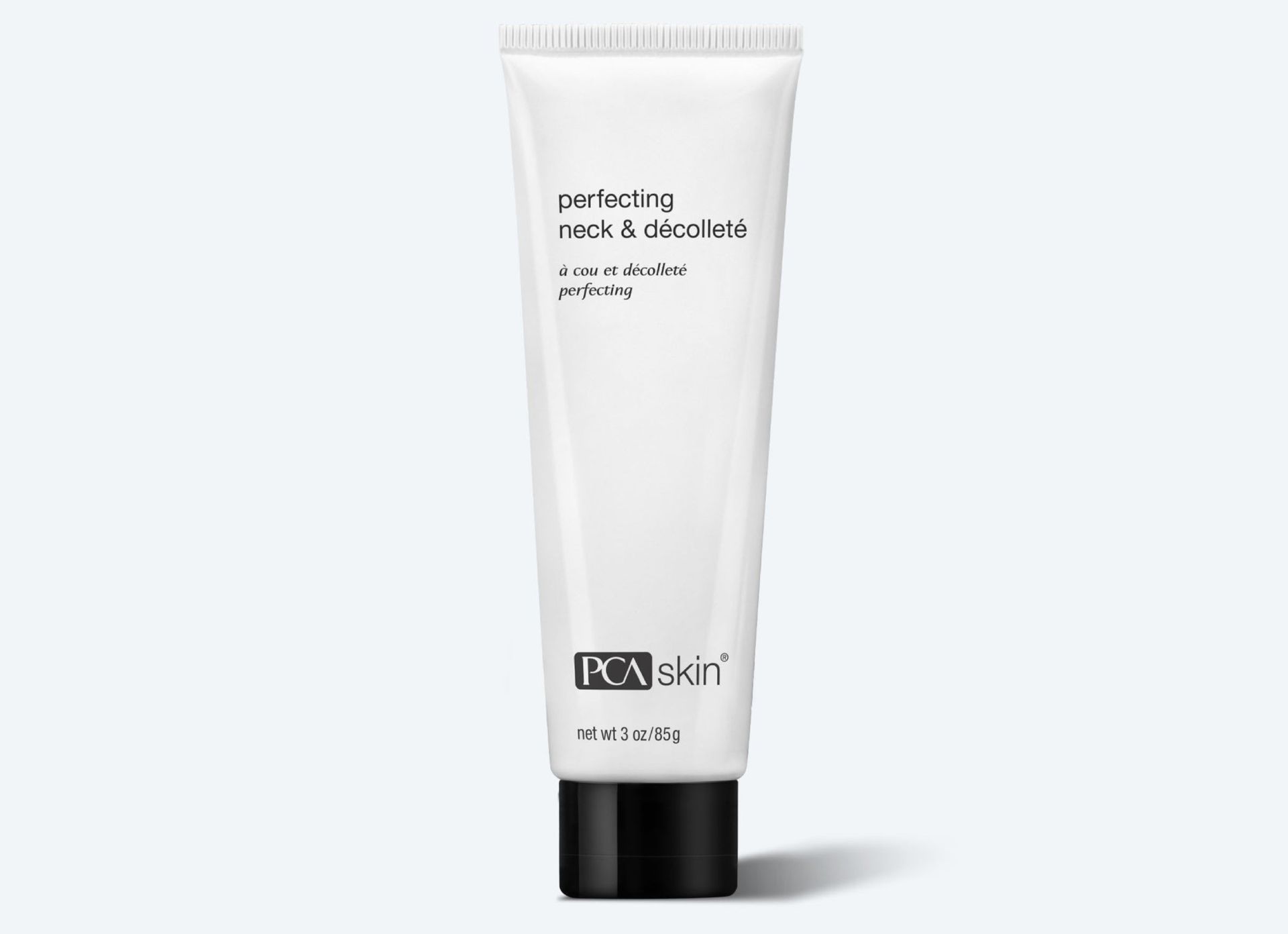 A tube of pca skin perfecting neck and decollete cream on a white background.