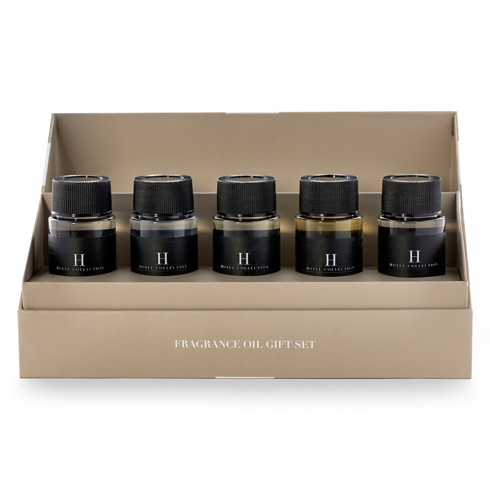 A box with five bottles of fragrance oil in it
