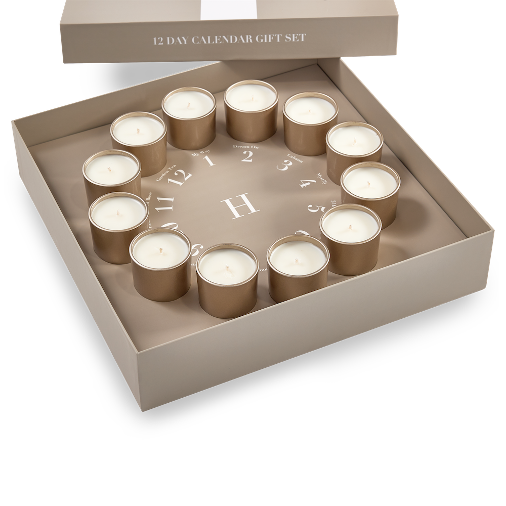 A box with 12 candles in it that looks like a clock
