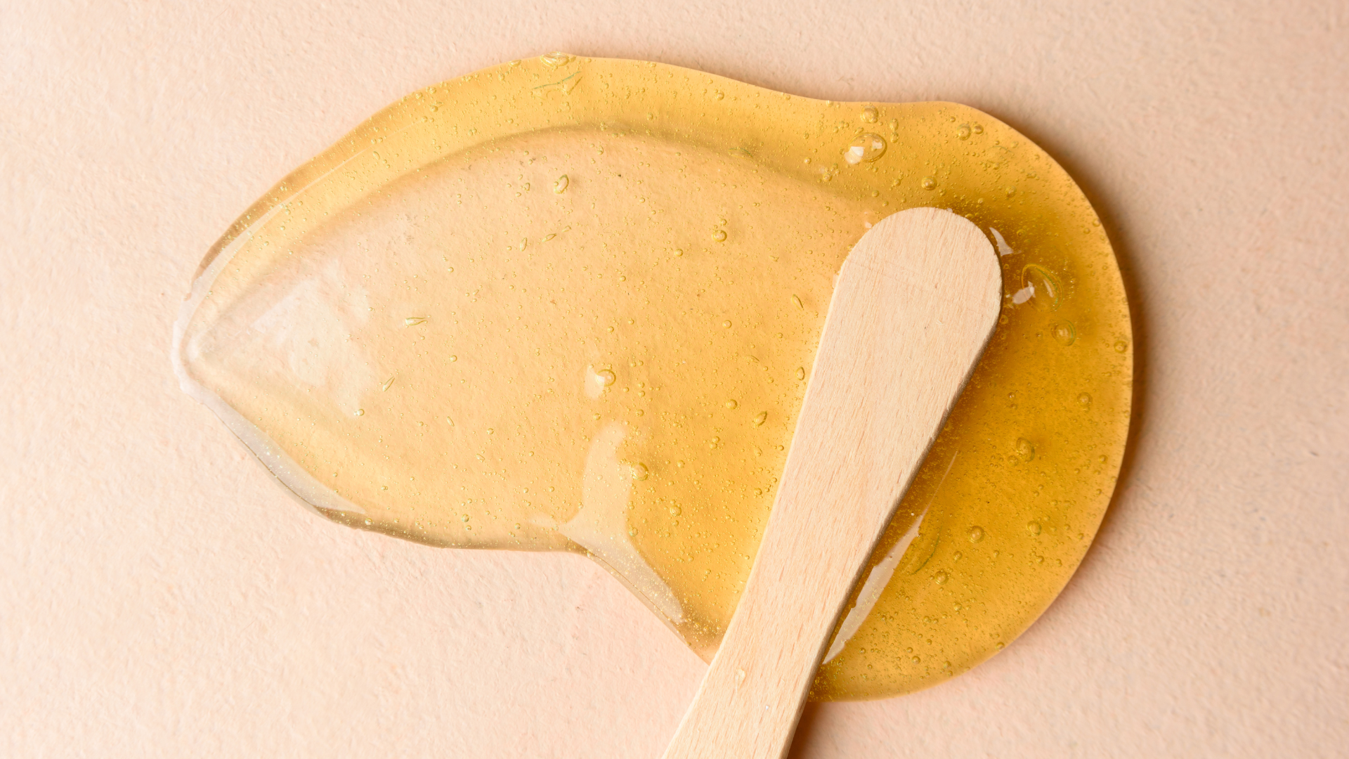 a woman is getting her face examined by a doctor .