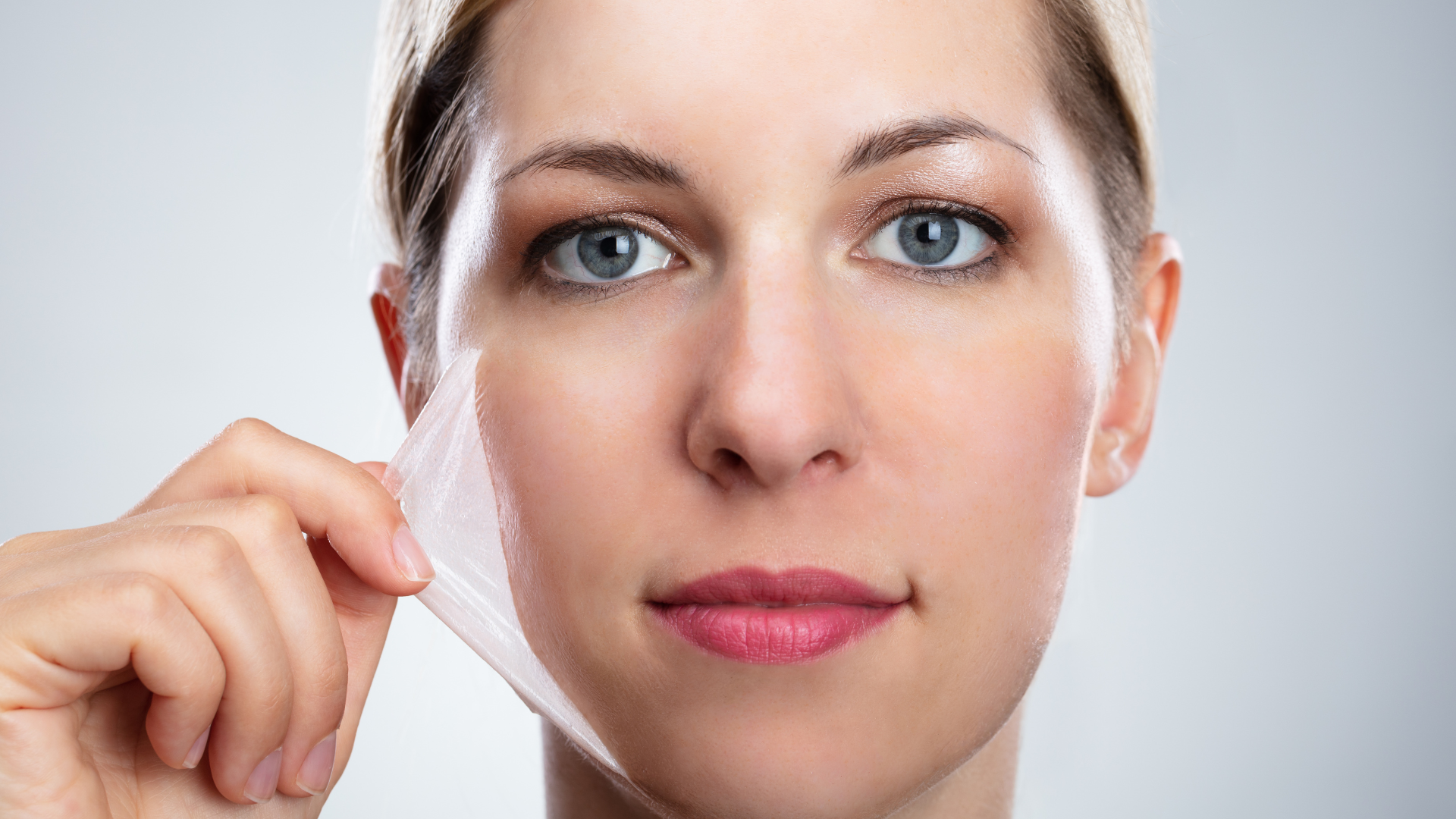 a woman is getting a facial treatment at a spa .