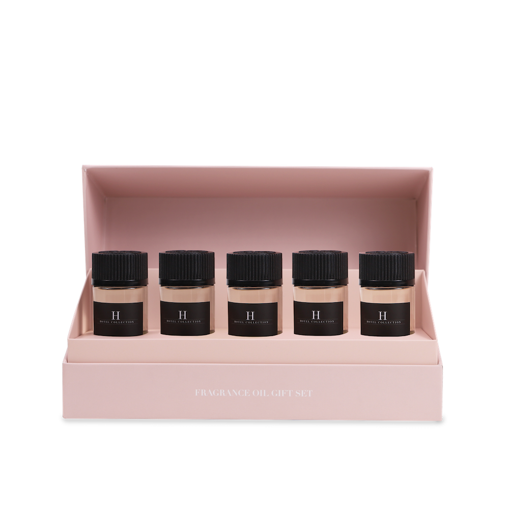 A box with four bottles of foundation in it.