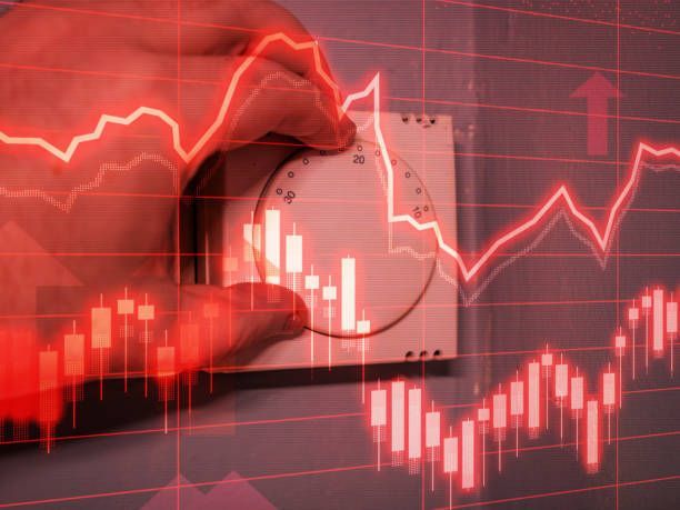 A Person Is Adjusting A Thermostat — St. George, UT — Artic Sun