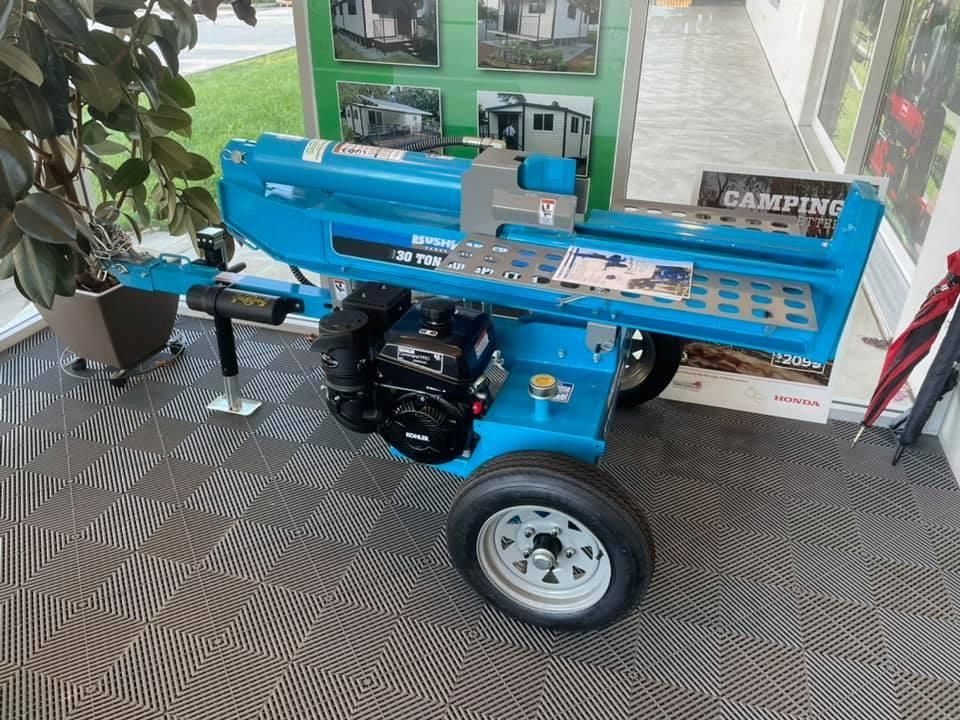 A Blue Log Splitter is on Display in a Store — Ireland's Machinery Pty Ltd In Braemar, NSW