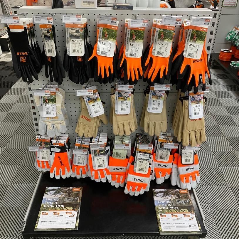 A STIHL Lawn Mower is Sitting on a Black Mat — Ireland's Machinery Pty Ltd In Braemar, NSW