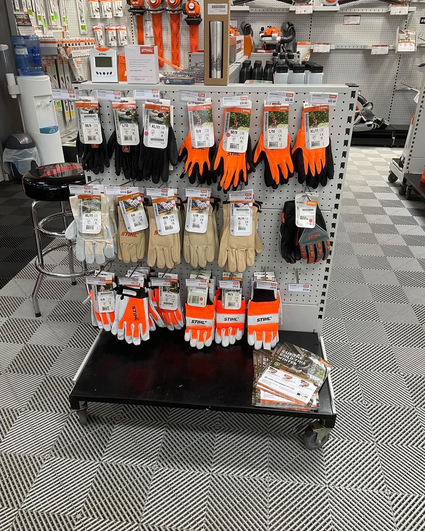 A Display of Gardening Gloves in a Shop — Ireland's Machinery Pty Ltd In Braemar, NSW