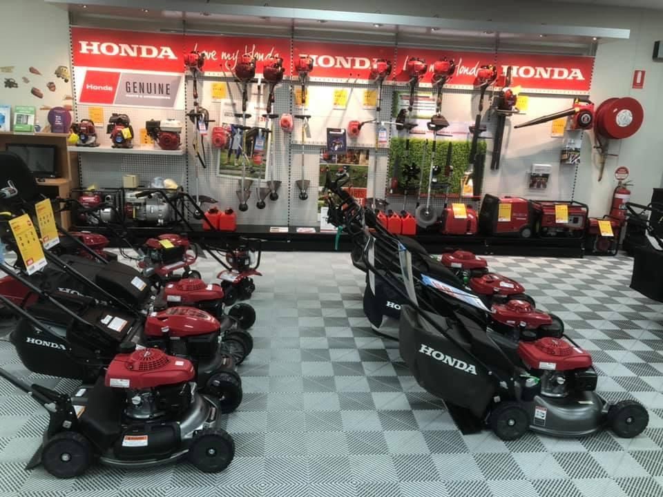 A Honda Lawn Mower is on Display in a Store β Ireland's Machinery Pty Ltd In Braemar, NSW