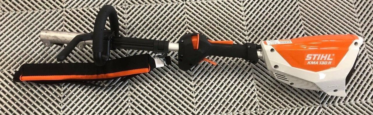 A STIHL Hedge Trimmer is Sitting on a Carpet — Ireland's Machinery Pty Ltd In Braemar, NSW