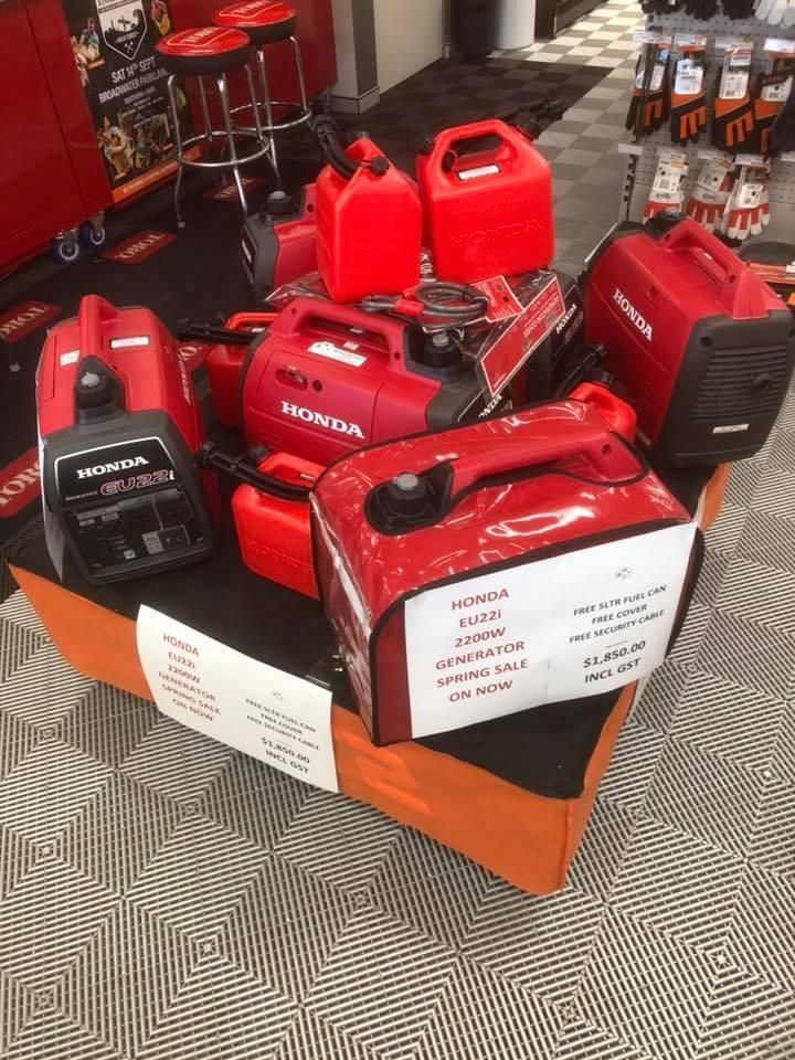 A Bunch of Red Honda Generators Are on Display in a Store — Ireland's Machinery Pty Ltd In Braemar, NSW