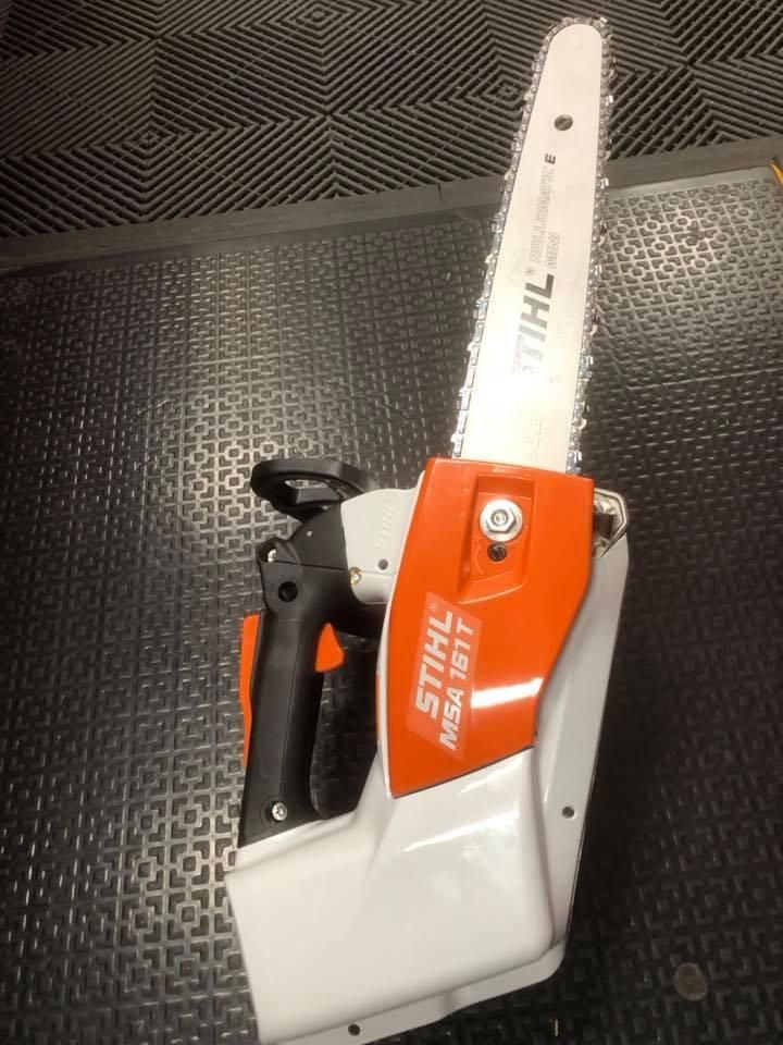 A Stihl Chainsaw Is Sitting On A Black Mat — Ireland's Machinery Pty Ltd In Braemar, NSW
