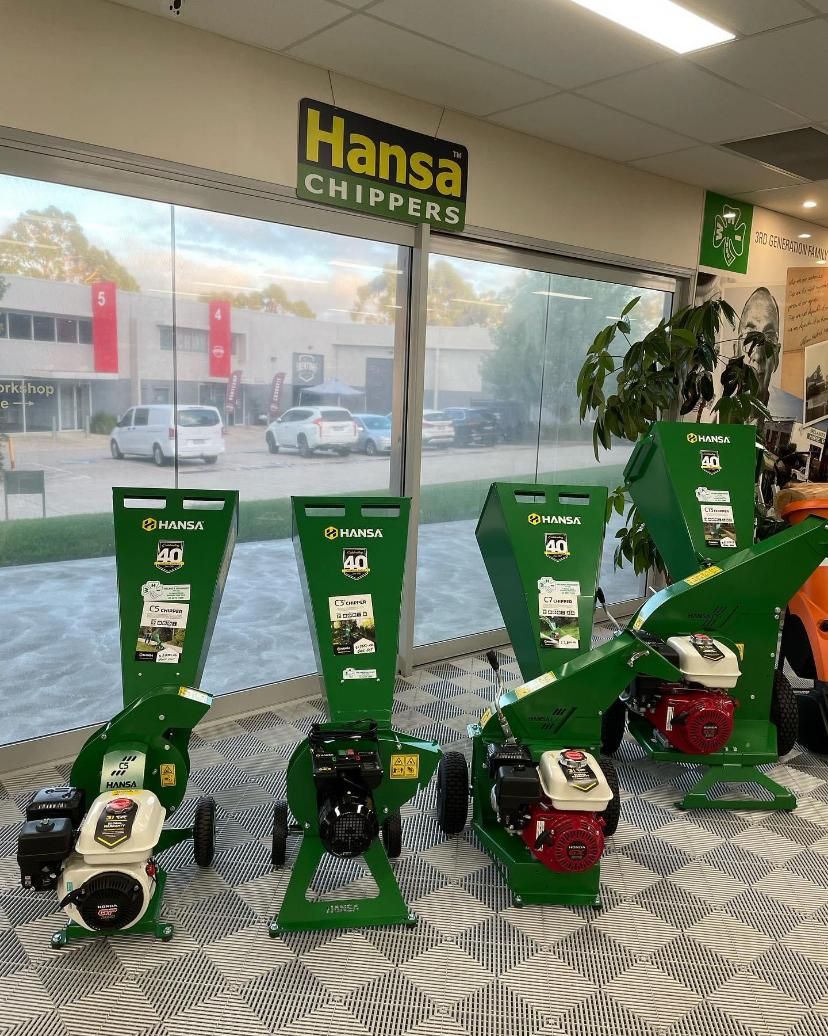 a Store Filled With Lots of Green Machinery — Ireland's Machinery Pty Ltd In Braemar, NSW