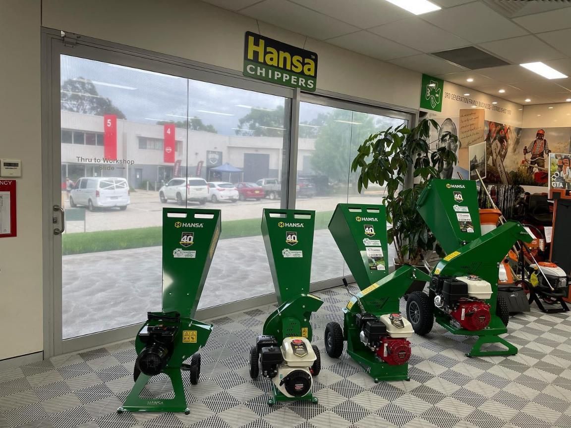 A Row of Green Shredders Are Lined Up in a Store — Ireland's Machinery Pty Ltd In Braemar, NSW