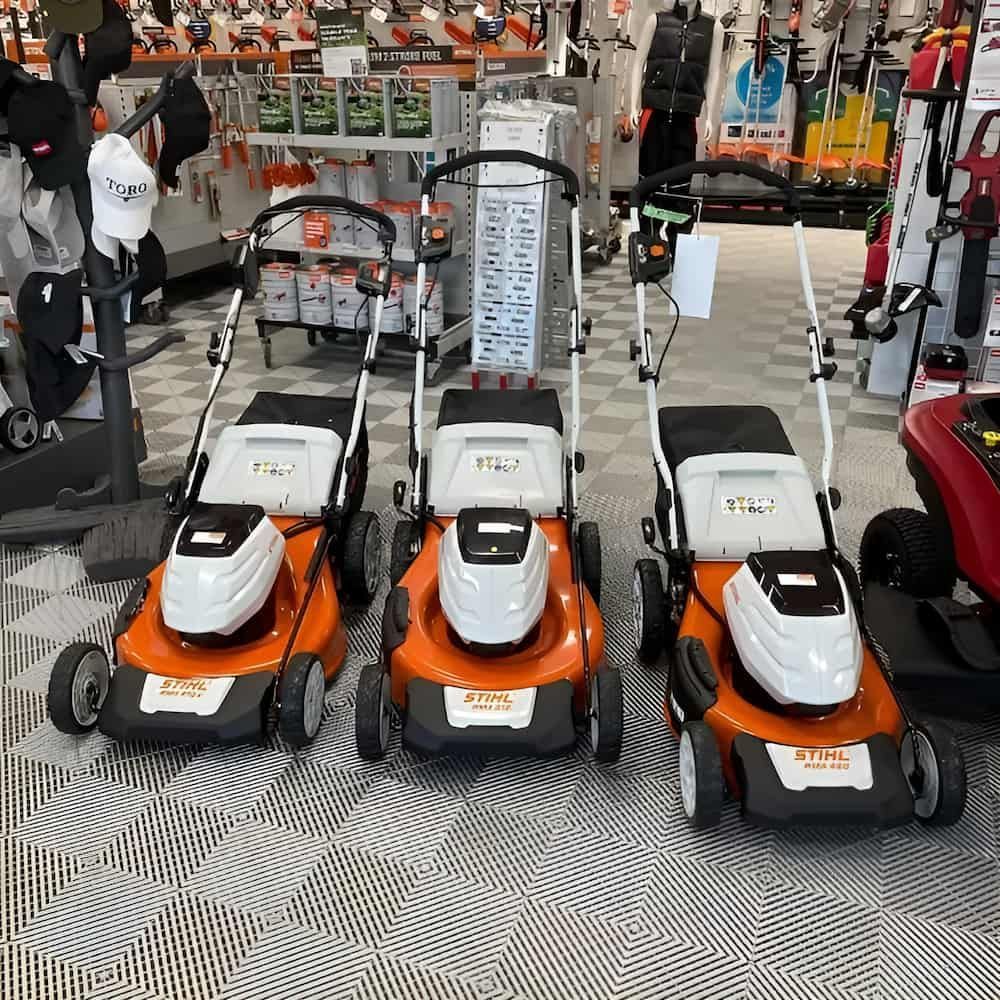 Three Lawn Mowers Are on Display in a Store — Ireland's Machinery Pty Ltd In Braemar, NSW
