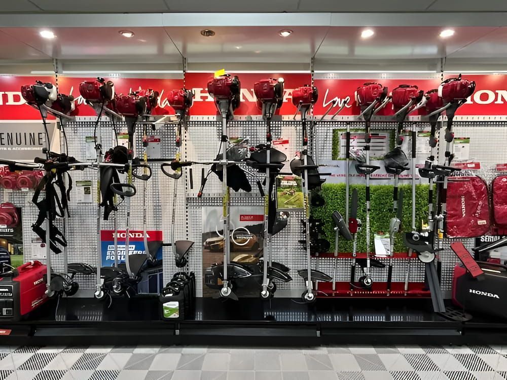A Display of Lawn Mower Engines in a Store — Ireland's Machinery Pty Ltd In Braemar, NSW