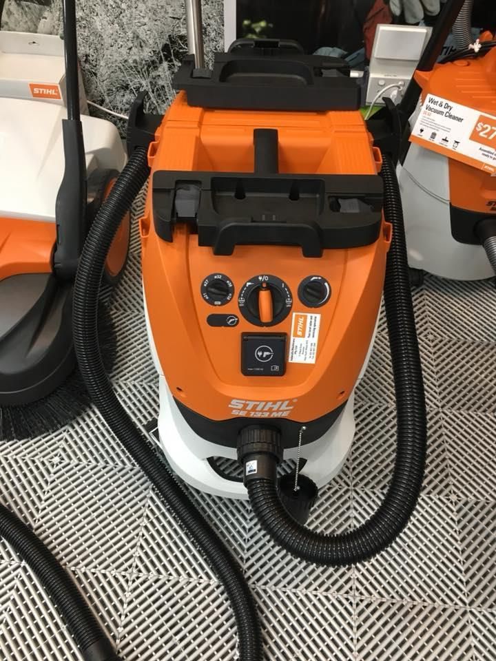A STIHL Vacuum Cleaner is Sitting on a Tiled Floor — Ireland's Machinery Pty Ltd In Braemar, NSW