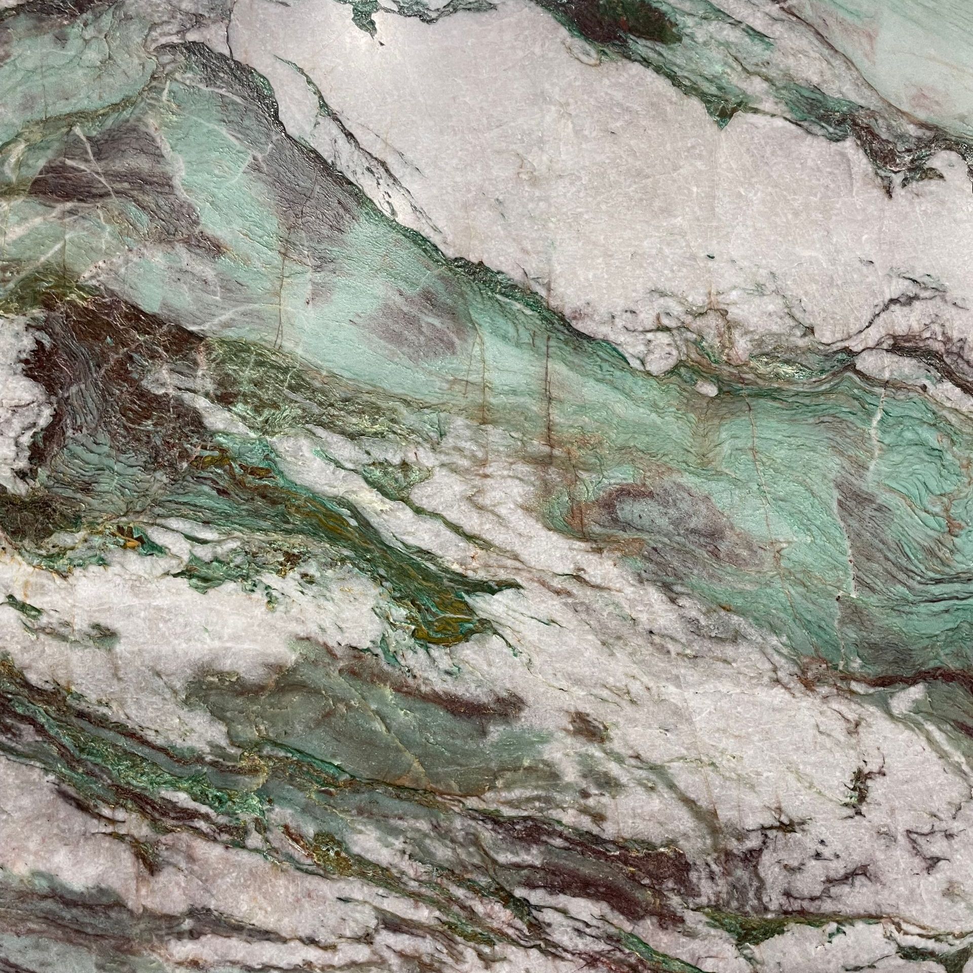Quartzite, Engineered stone, man-made, Marble look alike.