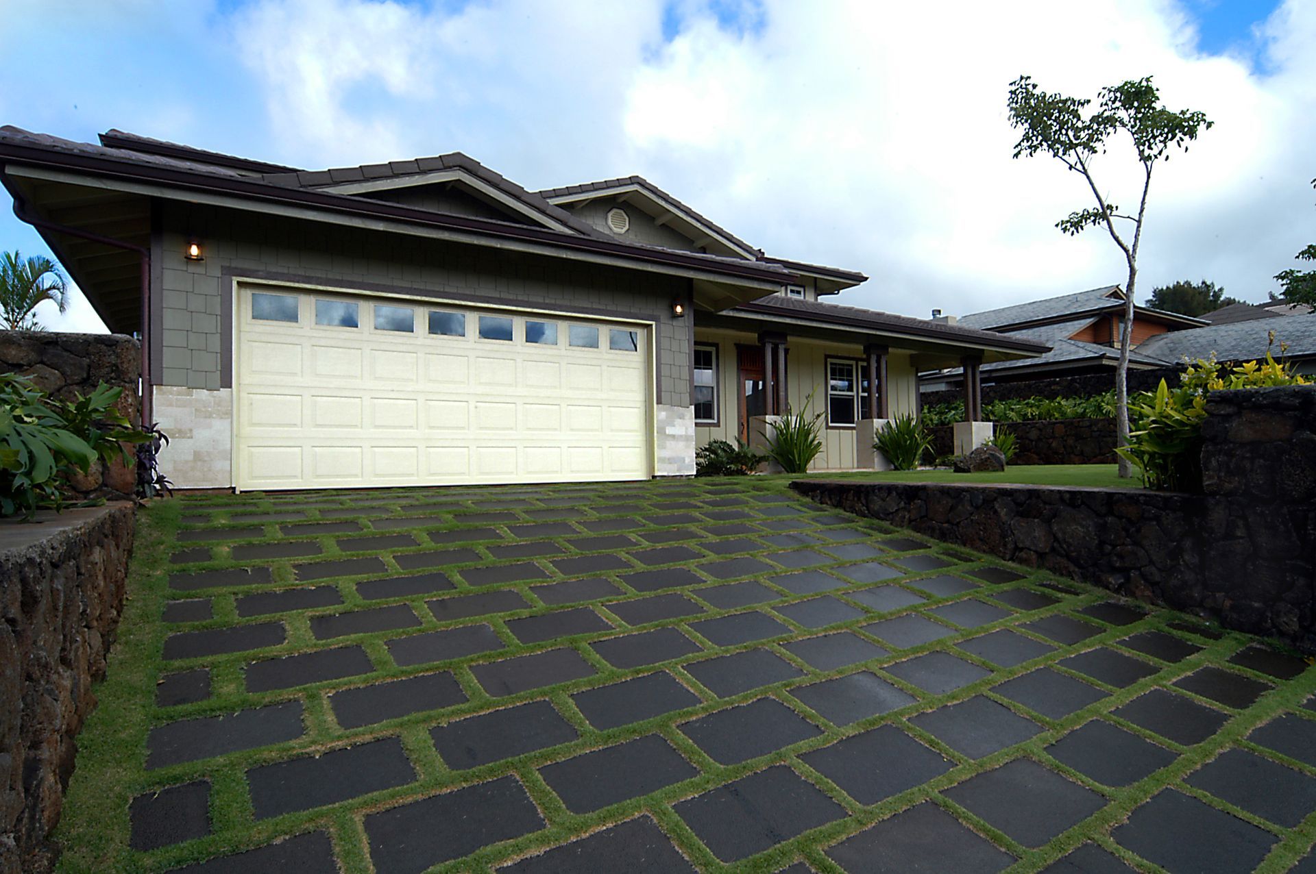 Driveway, Pavers, Puka Lava, Grass Joints, Natural Stone.