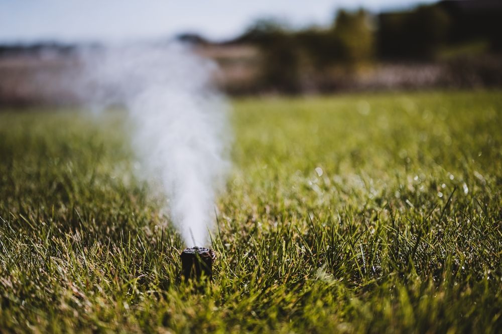 winterizing a irrigation sprinkler system by blowing pressurized air