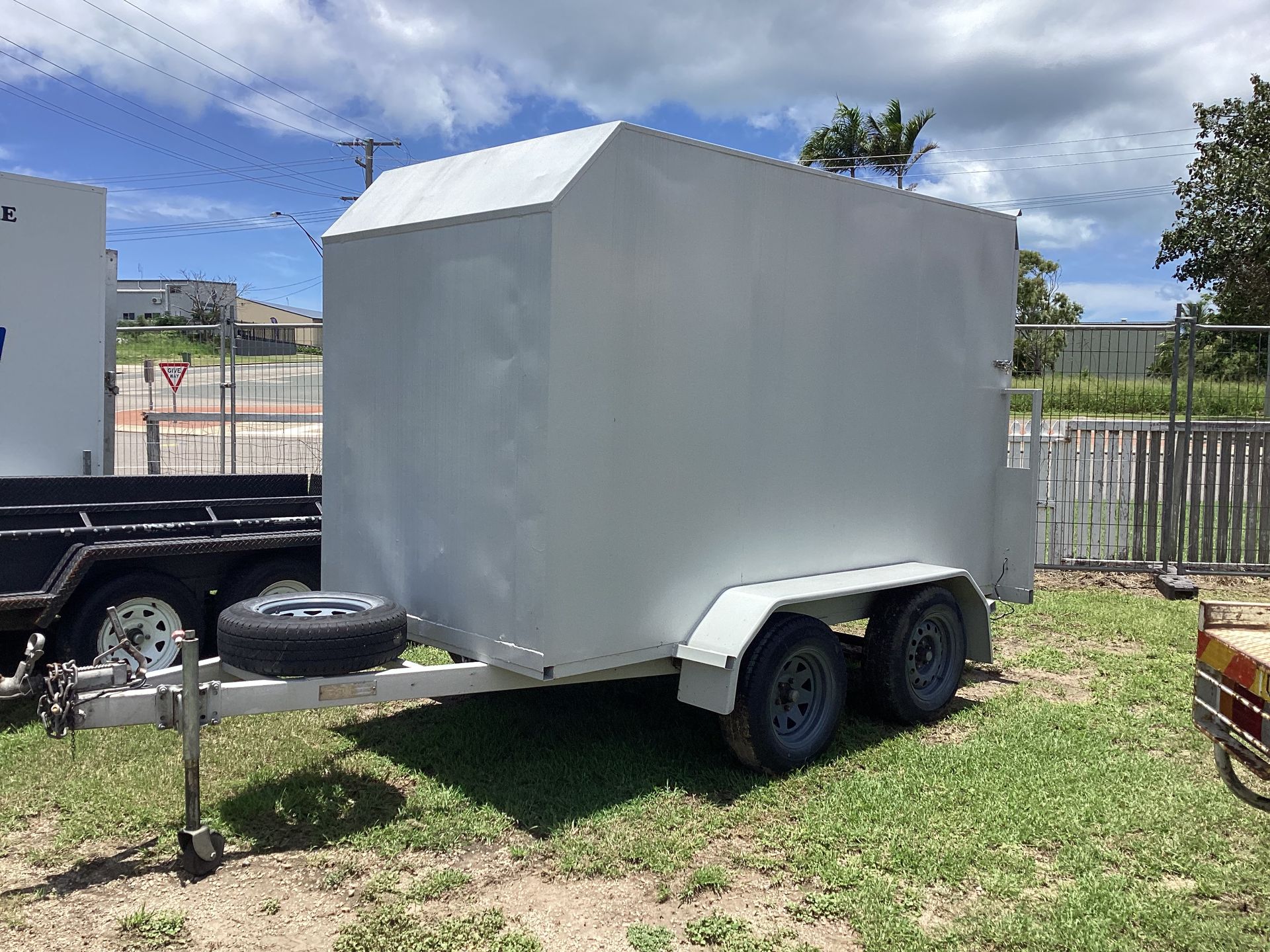 Gray Enclosed Cargo Trailer on A Dual Axle Hitch — Bowen Hire in Bowen, QLD