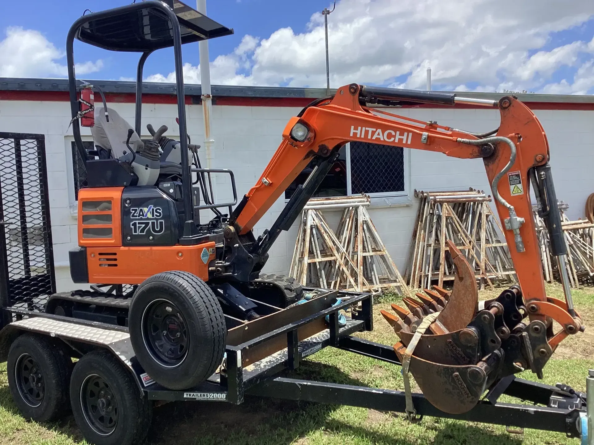 Orange Hitachi Mini Excavator on A Trailer — Bowen Hire in Airlie Beach, QLD