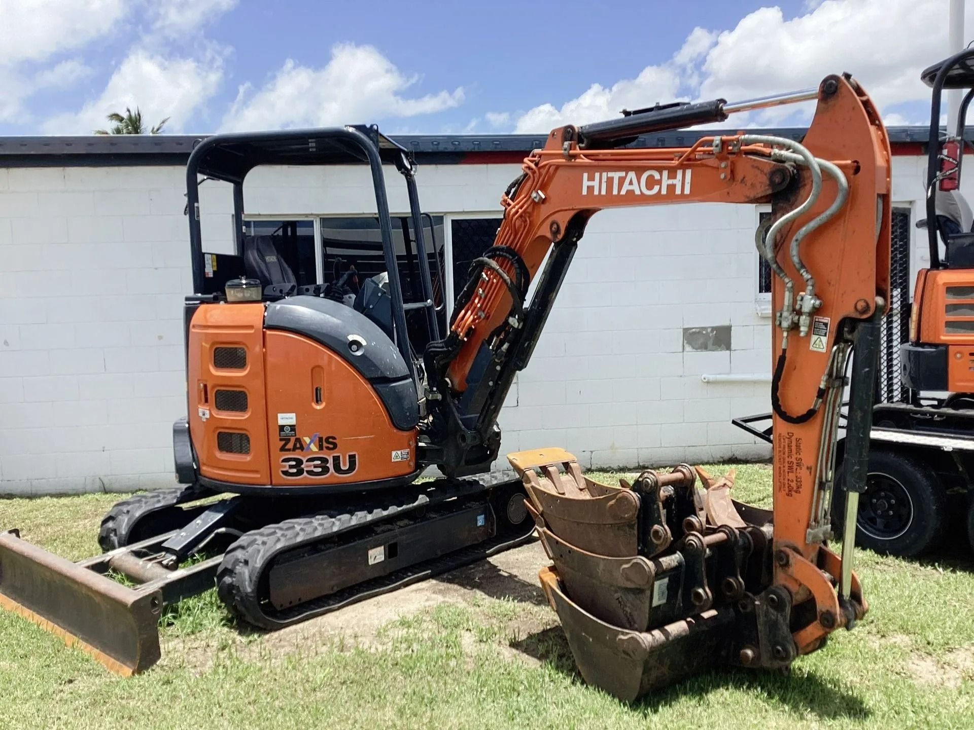 An Orange Hitachi Zx33u Mini Excavator — Bowen Hire in Bowen, QLD