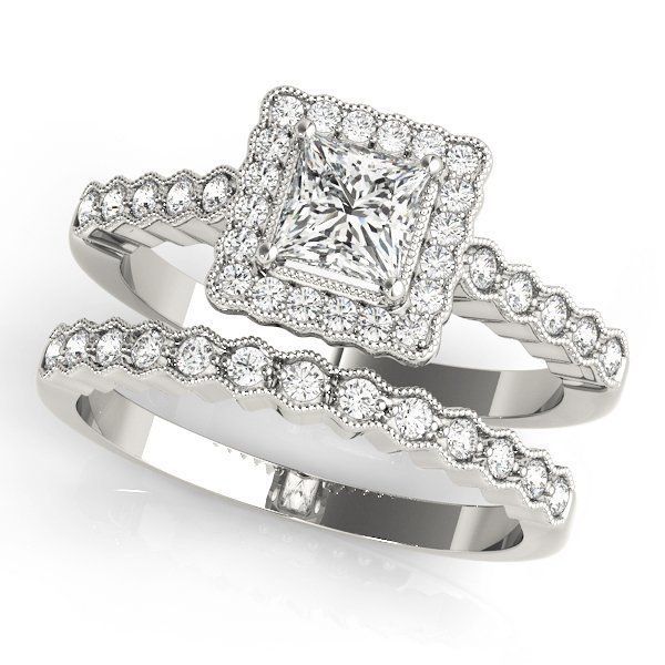 A white gold ring with a square diamond in the center