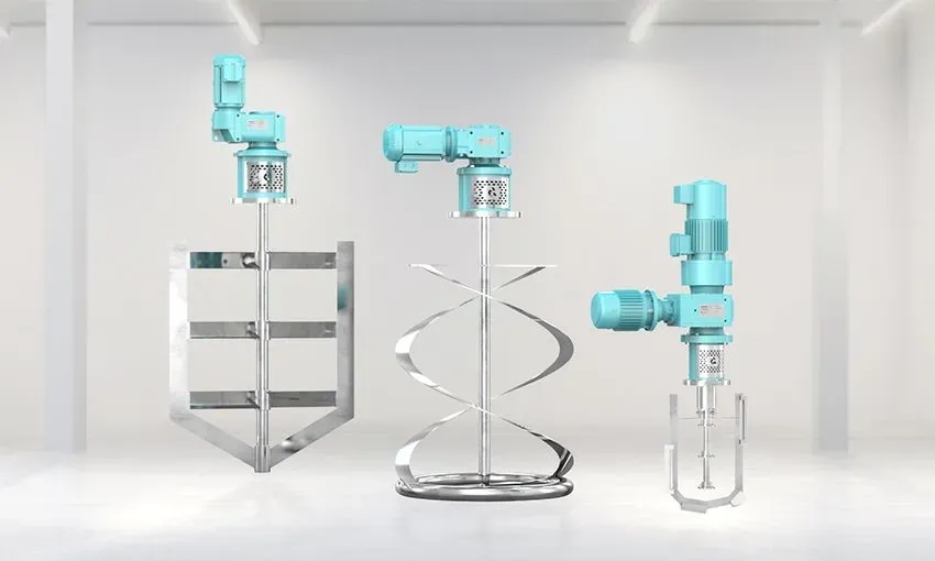 A factory with a lot of stainless steel tanks and pipes.