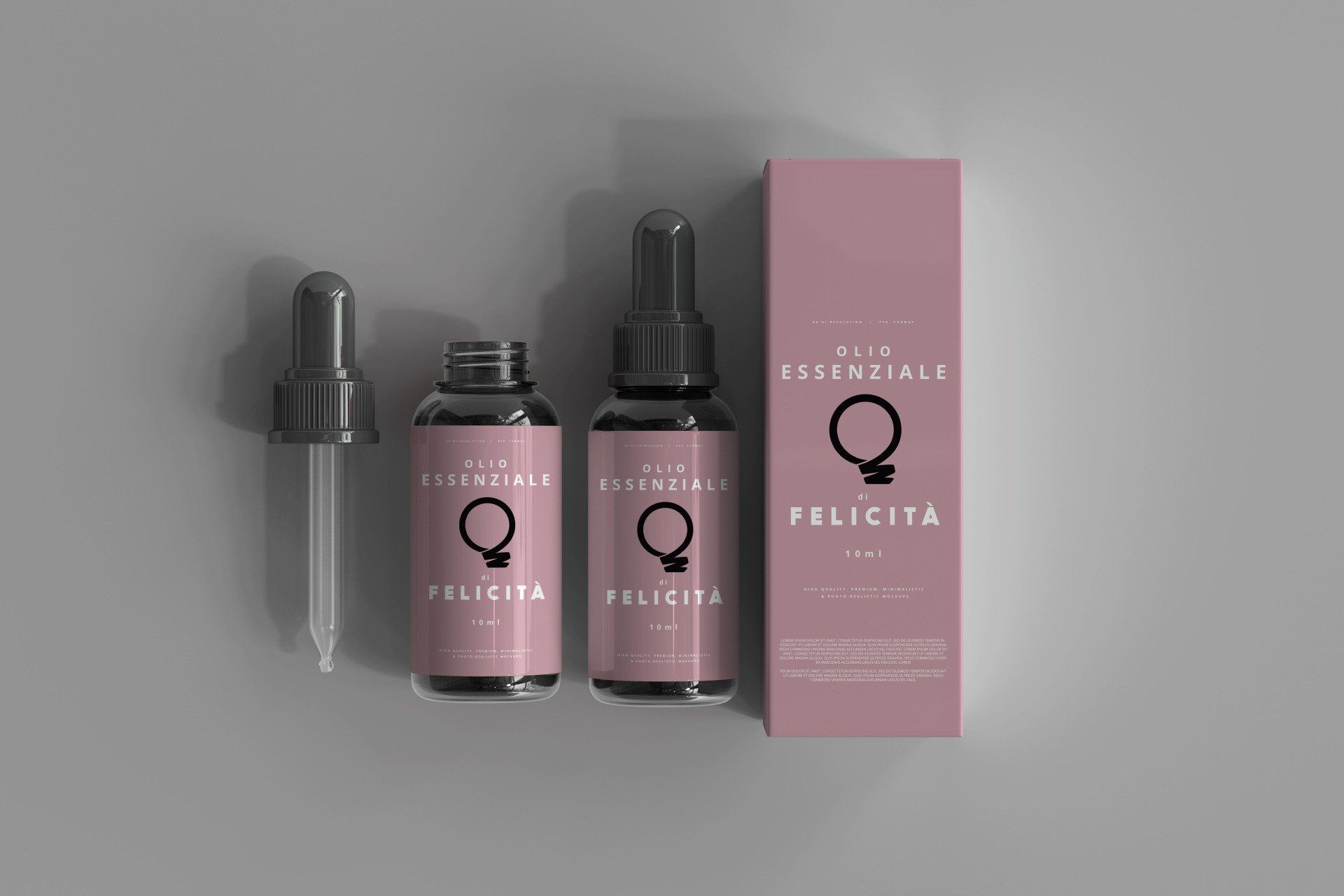 un modello di tre bottiglie e una scatola di oli essenziali.