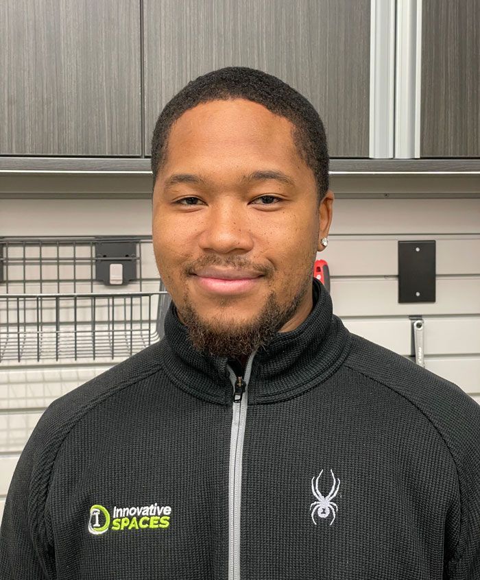 A silhouette of a person in a circle on a gray background.