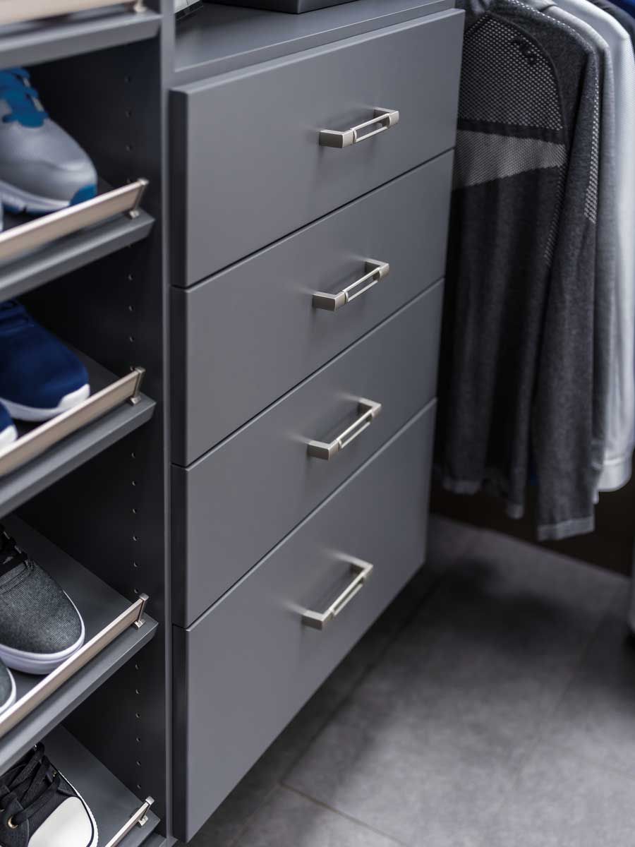 A drawer with a lot of jewelry in it