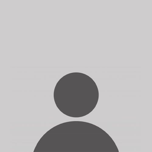 A silhouette of a person in a circle on a gray background.