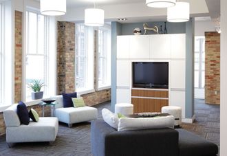 A living room filled with furniture and a flat screen tv