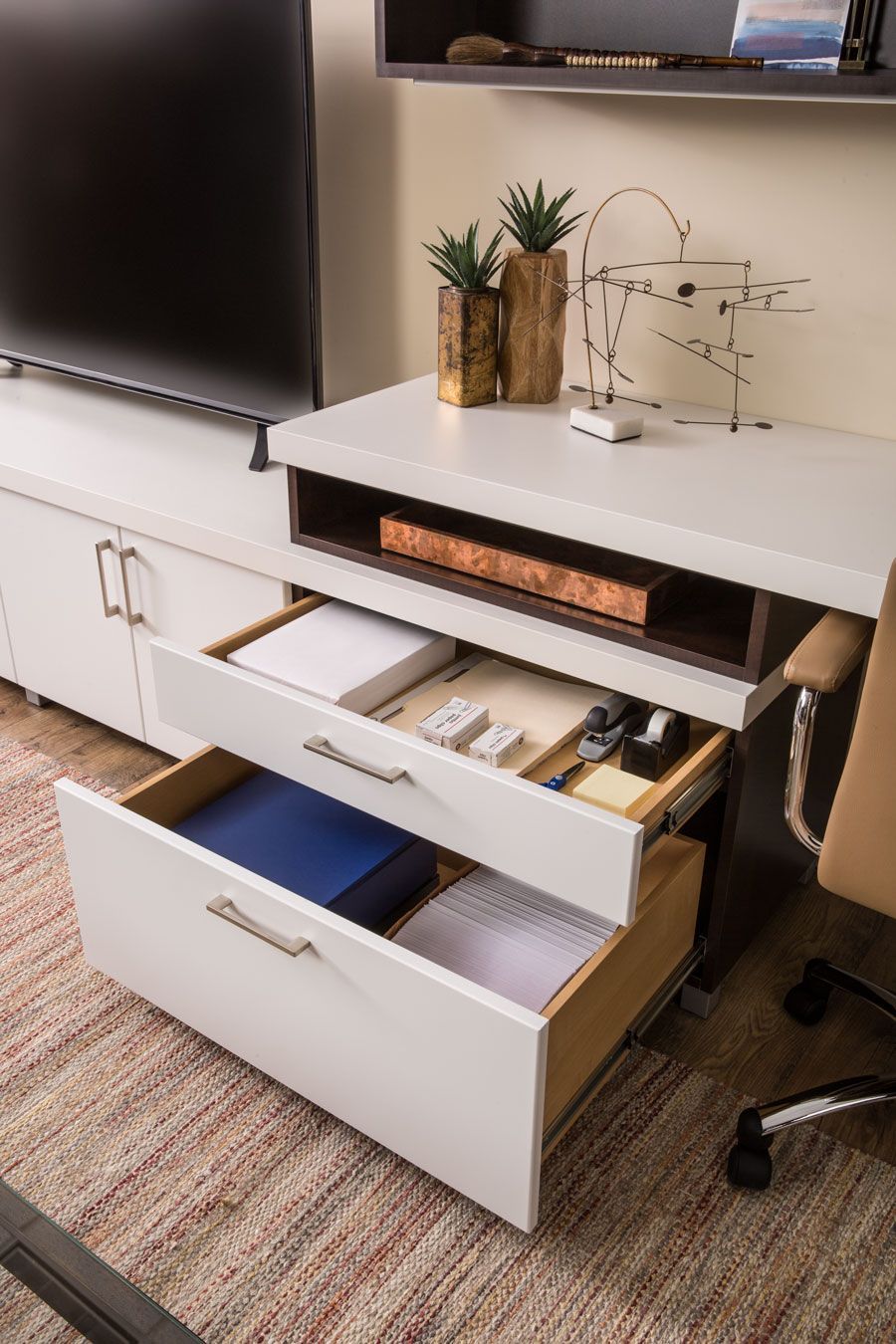 Home office cabinet with built-in drawers.
