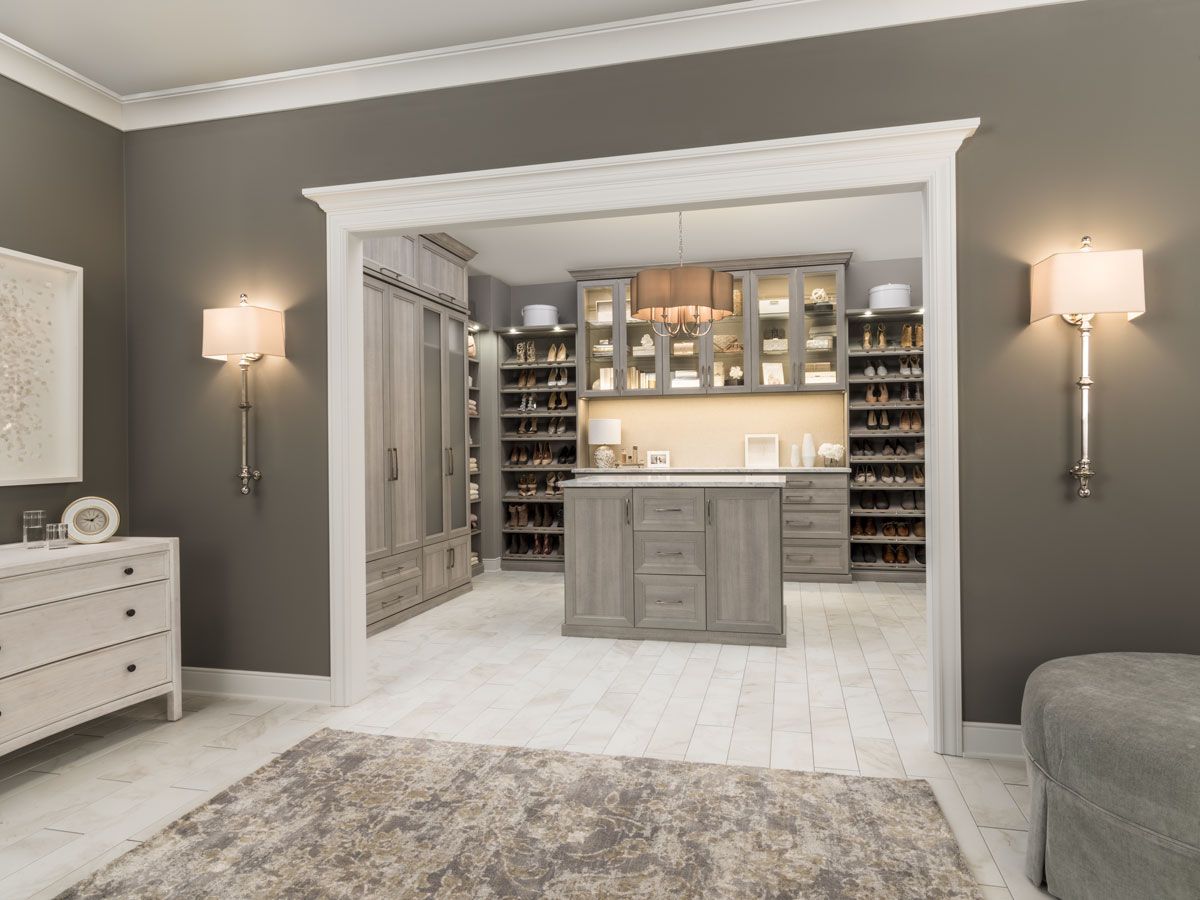 A rendering of a walk in closet in a bedroom.