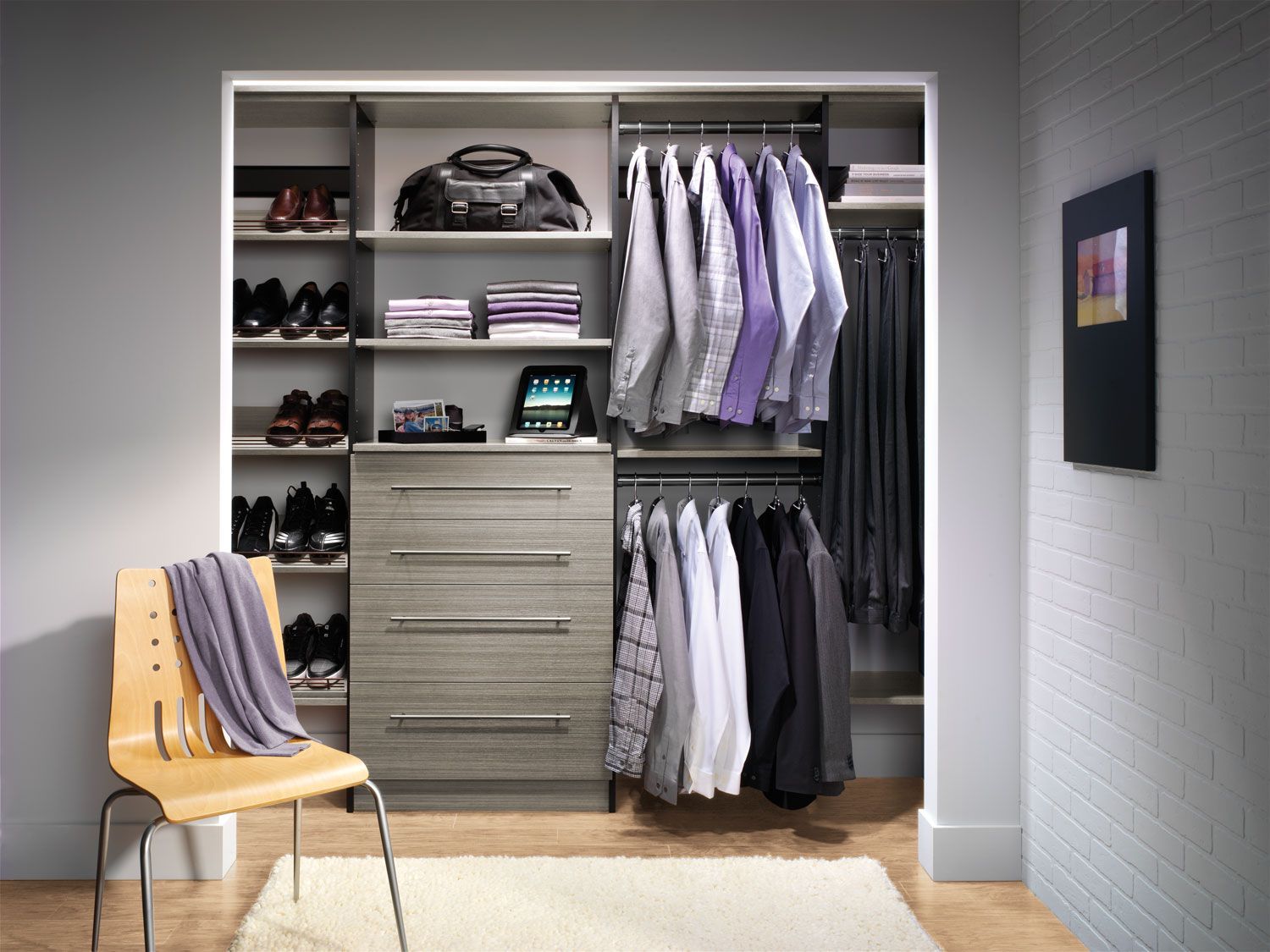 A walk in closet filled with clothes and a chair