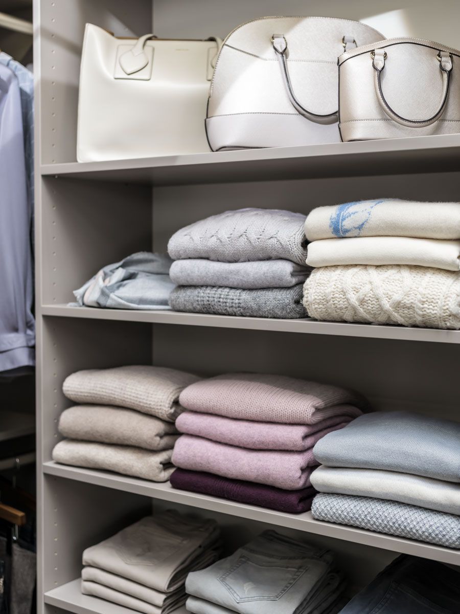 A closet with clothing shelves.
