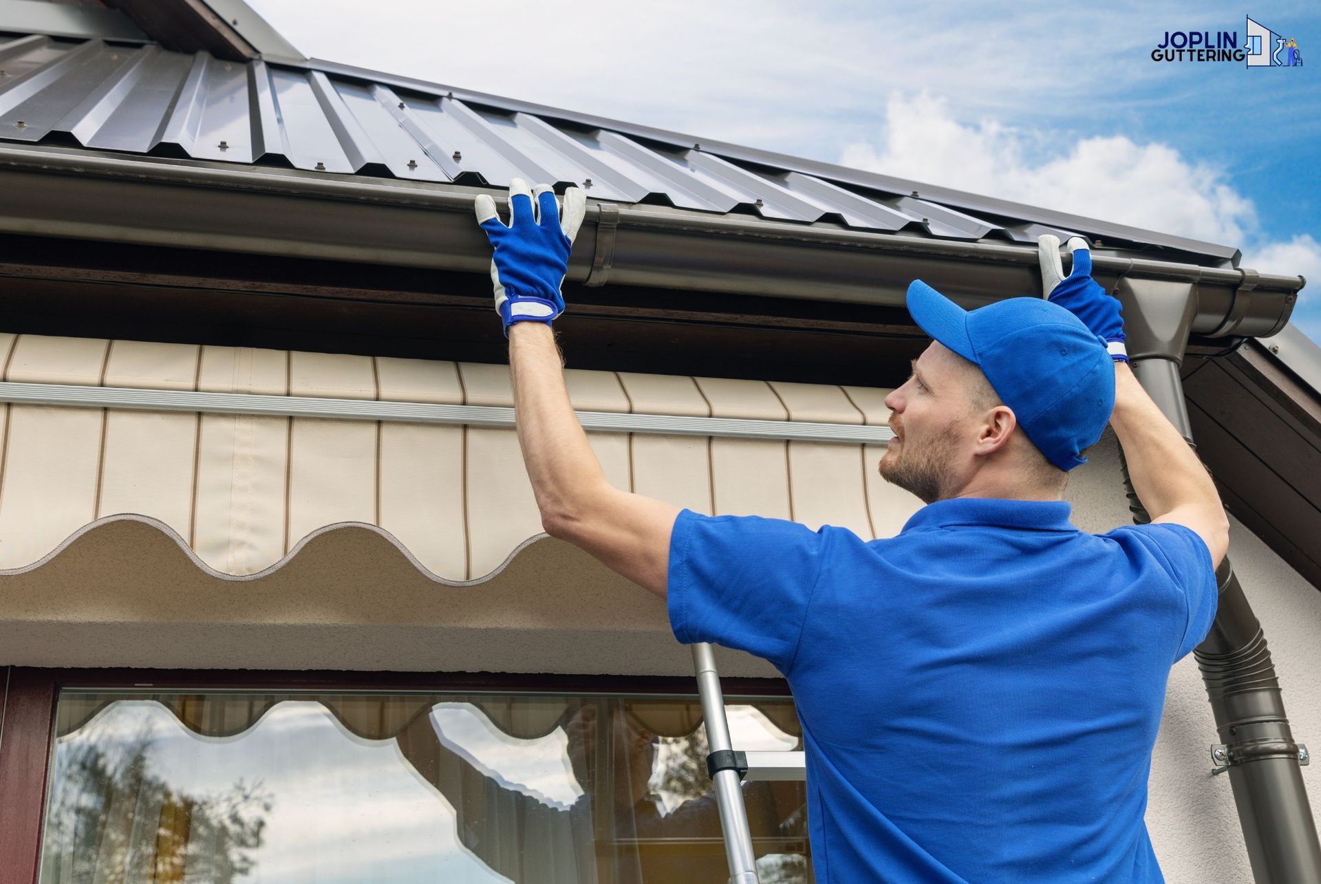 a professional installing a guttering services for a residential property in  Joplin