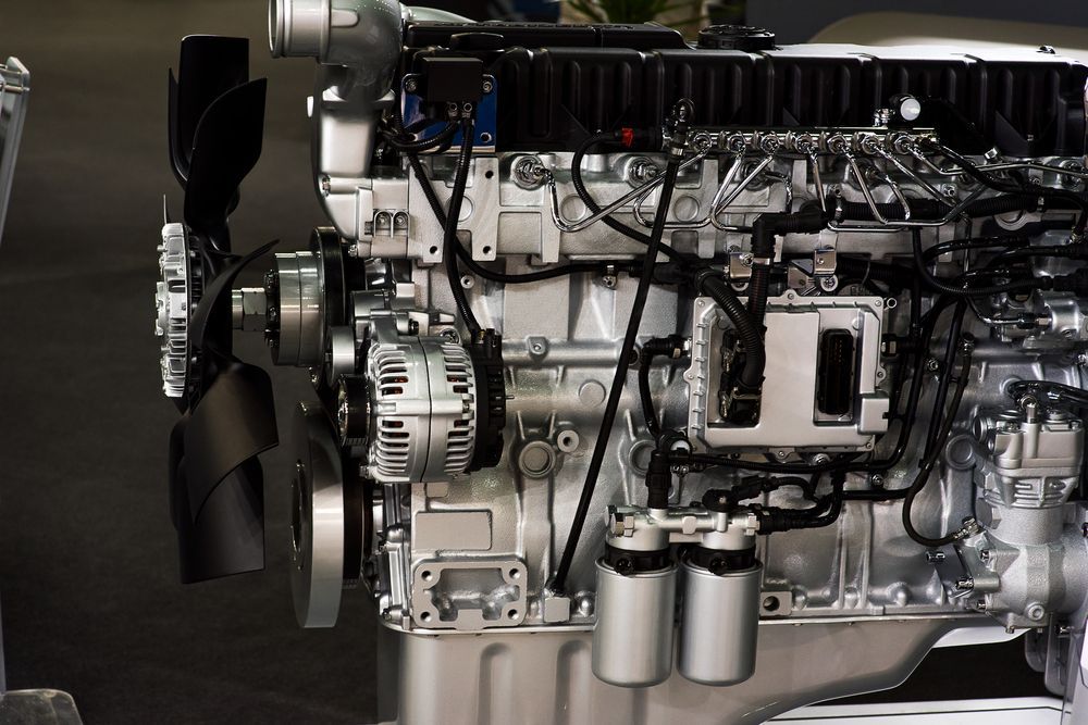 A Close Up of a Diesel Engine With a Fan — Sure Shot Sprayer Australia in Alice Springs, NT