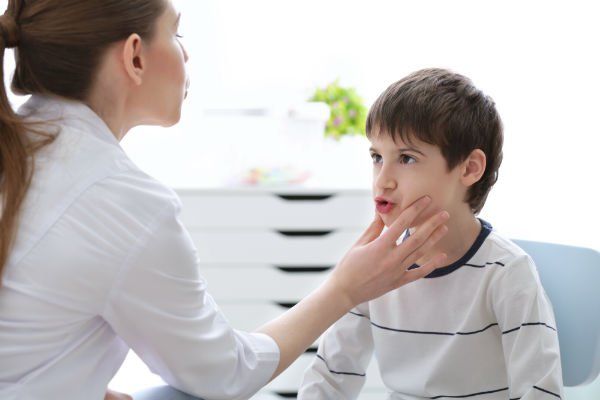 Little boy at speech therapist office