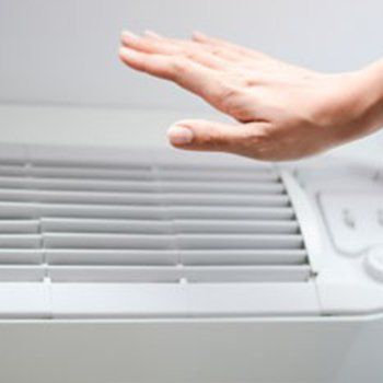 checking air conditioner - Baker Appliance And Refrigeration Service In Yorktown, VA